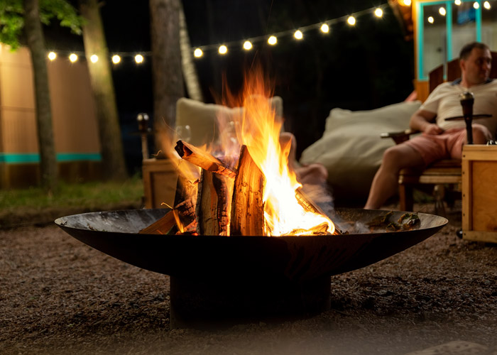 Roaring fire in a fire pit at night